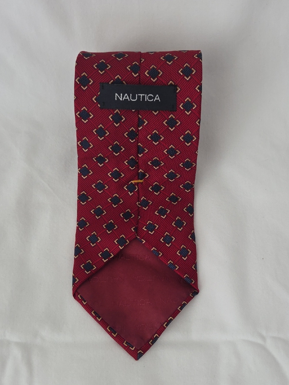 Nautica Men's Red Tie with Navy and Gold Geometric Motif